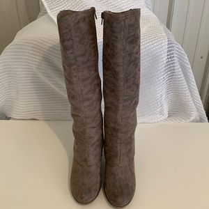 Neutral flirty knee high boot!